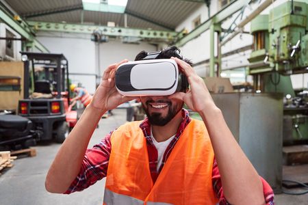 Warehouse employee using an Augmented Reality headset to manage the warehouse.